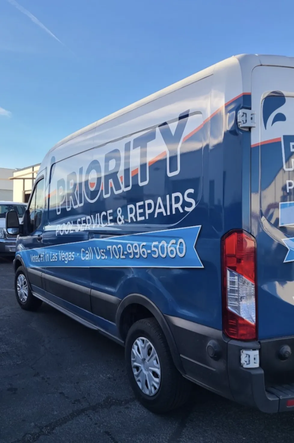 Priority Pool Service branded van at the shop